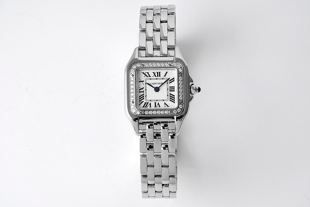 Cartier watch with silver metal bracelet and rectangular diamond bezel