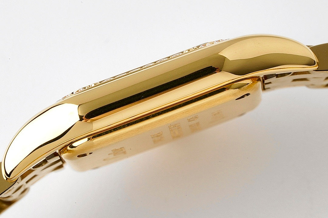 Gold-tone wristwatch side profile with curved case and crown; linked bracelet visible