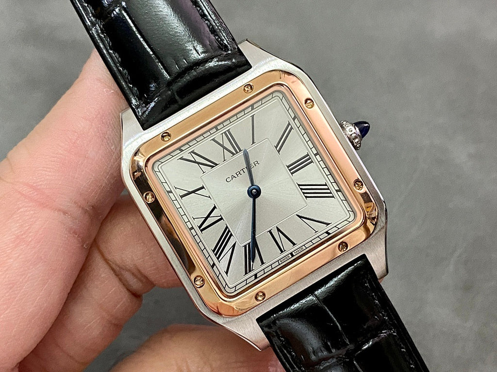 Cartier wristwatch close-up, black leather strap, Roman numeral dial and rose-gold bezel