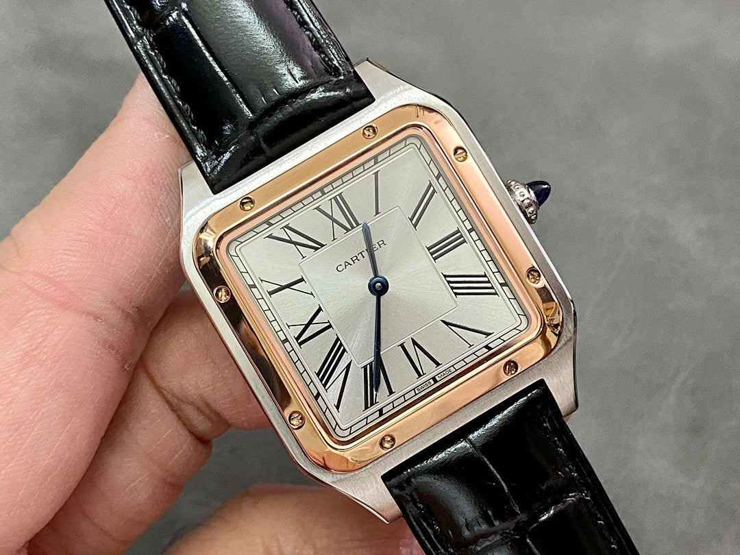 Cartier wristwatch close-up, black leather strap, Roman numeral dial and rose-gold bezel