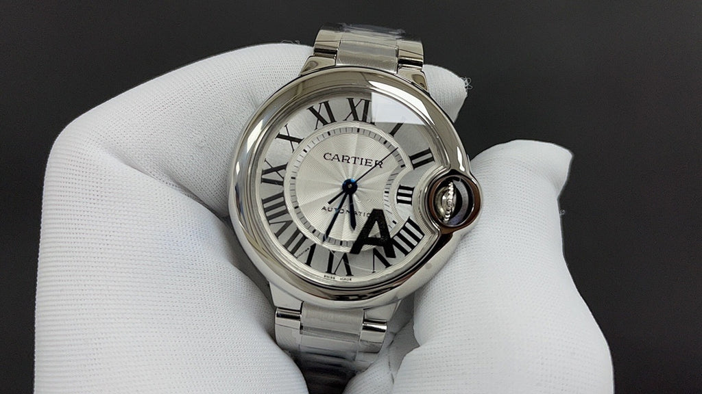 Cartier watch, silver case and bracelet, white dial with Roman numerals and dark hands
