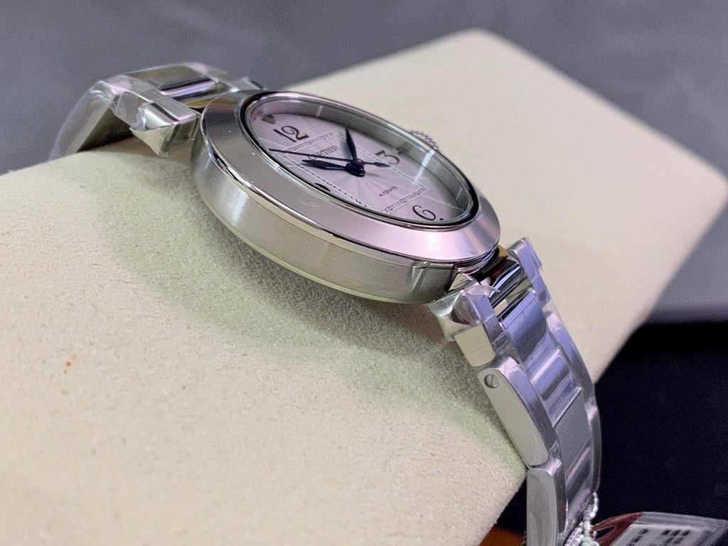 Cartier wristwatch angled side profile with stainless steel bracelet and crown