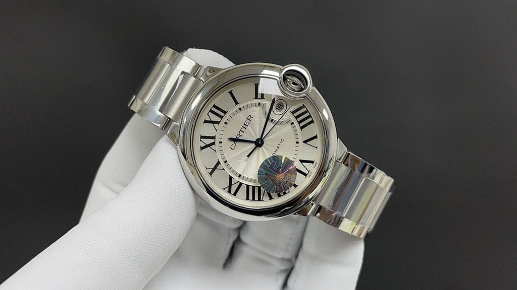 Cartier watch angled view, silver-tone bracelet, Roman numeral dial