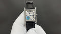 Cartier wristwatch with black leather strap and silver-tone rectangular case