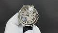 Cartier wristwatch with silver case, Roman dial, black leather strap