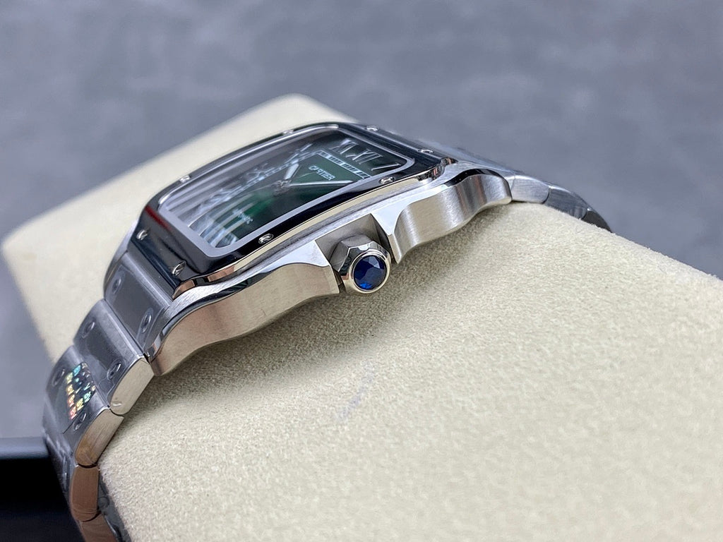 Cartier wristwatch with green dial, silver case, and blue-accent crown