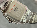 Cartier watch case back with engraved text and stainless steel bracelet