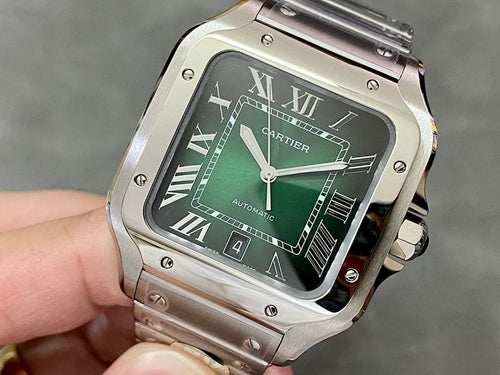 Cartier watch with green dial, Roman numerals, and stainless steel case