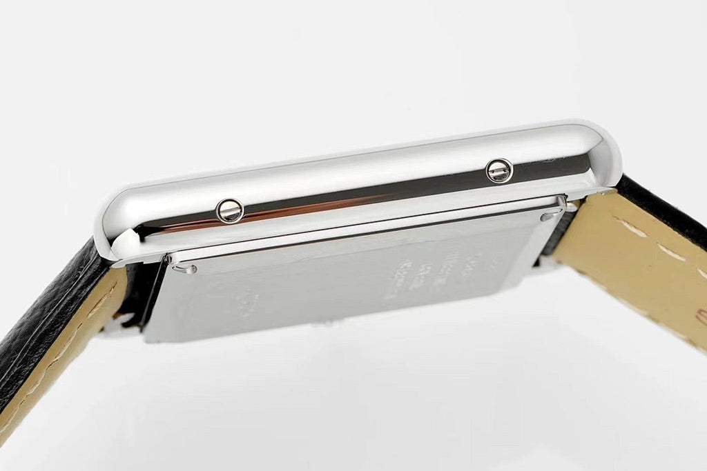 Cartier watch crown side view with stainless steel case and integrated bracelet