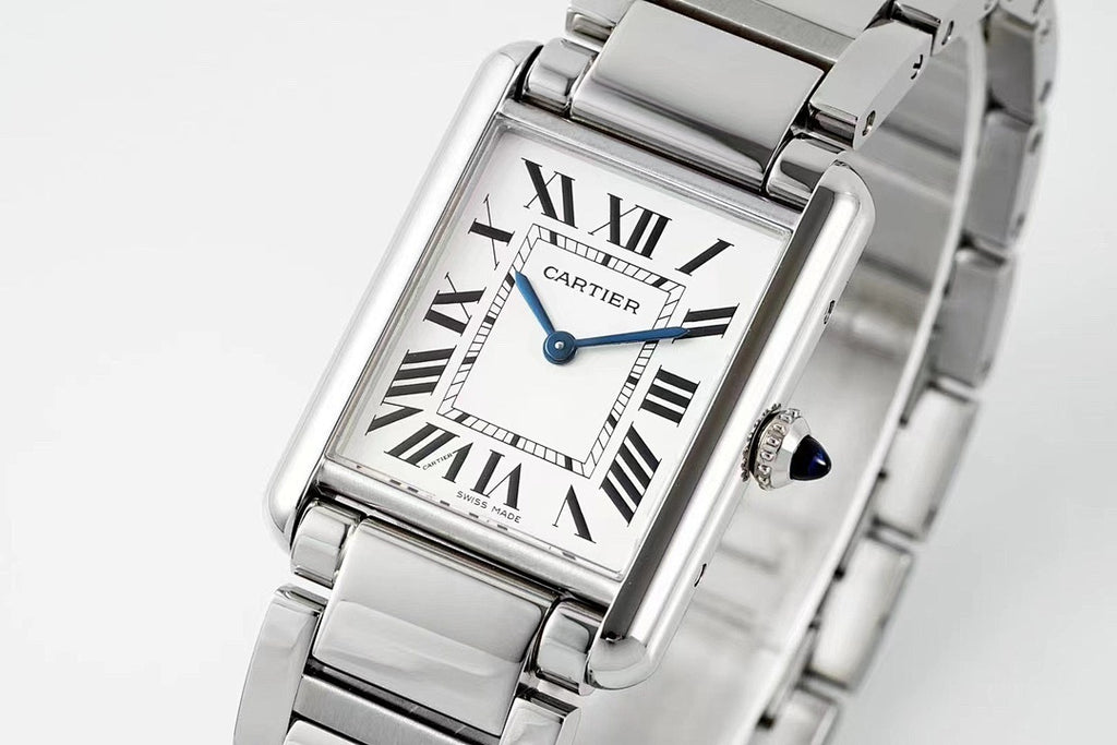 Cartier watch front view with Roman numeral dial, blue hands, and stainless bracelet