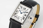 Cartier wristwatch angled view with black leather strap, silver case, Roman numerals