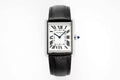Cartier wristwatch with black leather strap and silver rectangular case, Roman numerals