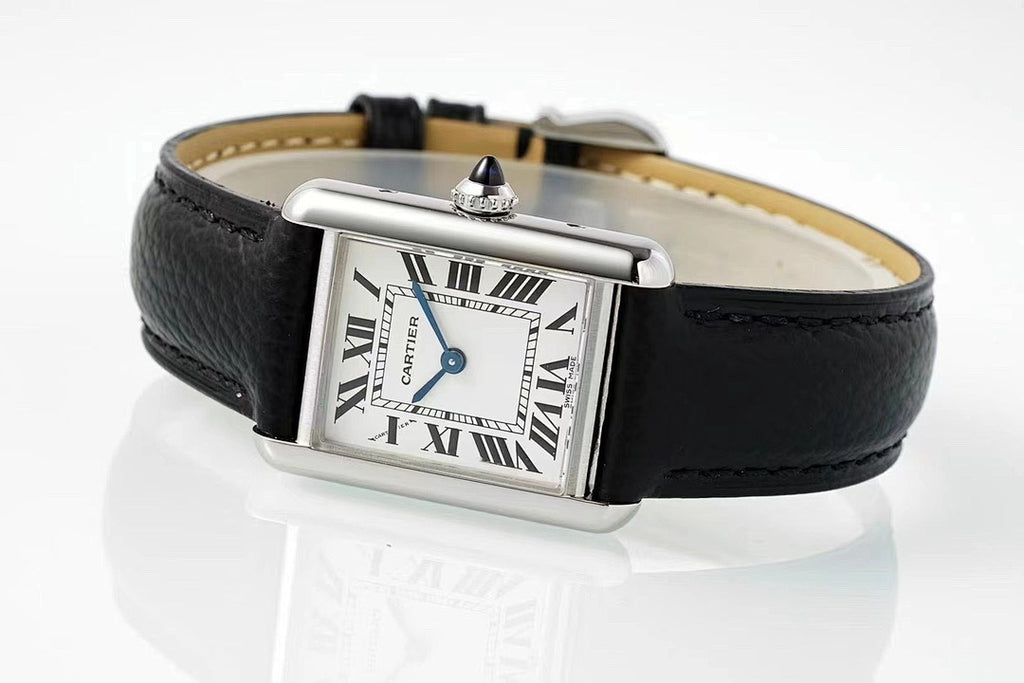 Cartier wristwatch with black leather strap, silver buckle, and Roman numeral dial