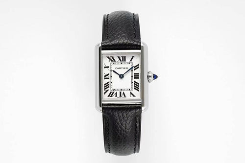 Cartier wristwatch with black leather strap and rectangular silver case, Roman dial