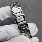 Cartier two-tone metal link bracelet with polished silver and gold center bars