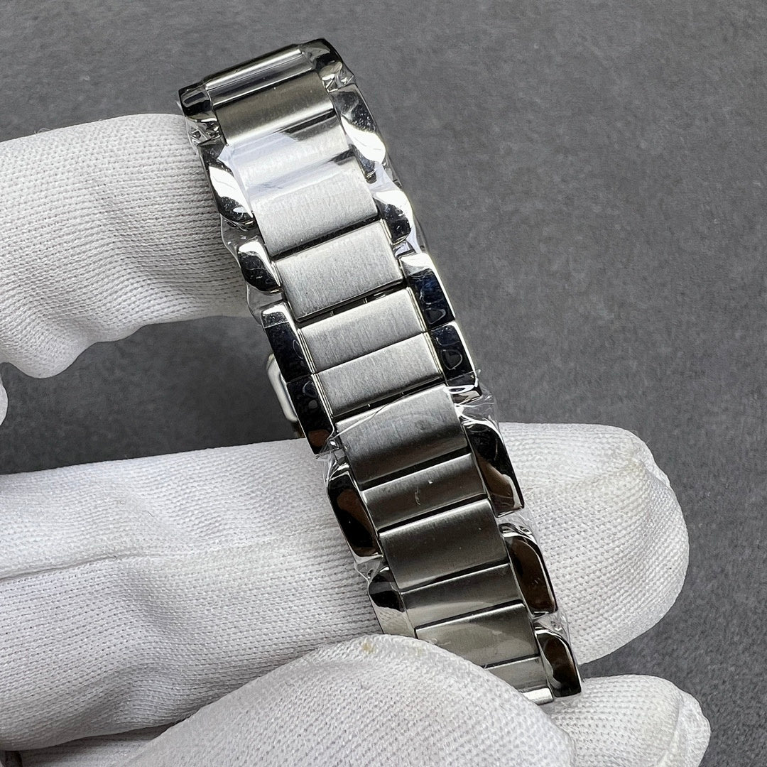 Cartier two-tone metal link bracelet with polished silver and gold center bars