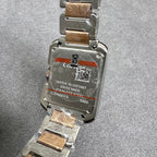 Cartier watch case back with “WATER RESISTANT” text and stainless steel markings