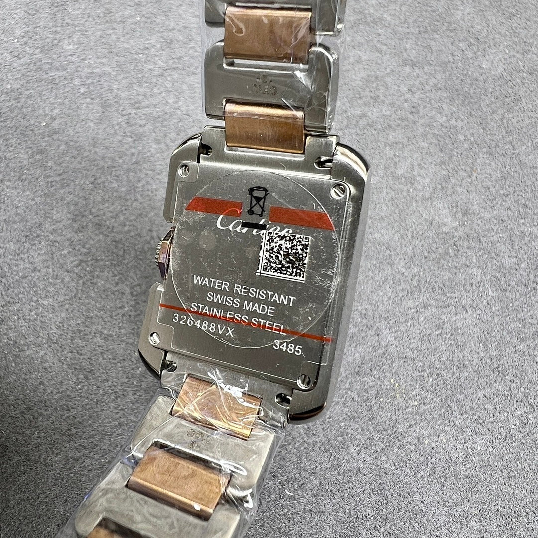 Cartier watch case back with “WATER RESISTANT” text and stainless steel markings