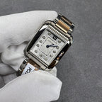 Cartier two-tone square wristwatch with silver dial and Roman numeral XII in bezel