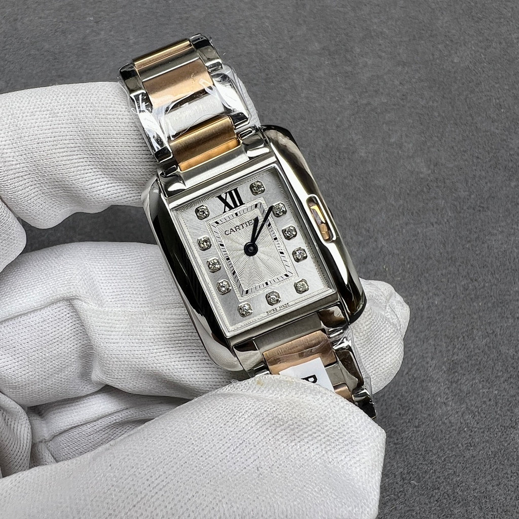Cartier two-tone square wristwatch with silver dial, Roman numeral XII, and dark hands