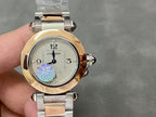 Cartier watch angled view with gold bezel, silver bracelet, and white dial with blue/purple motif