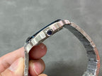 Cartier steel watch side profile with crown and blue dial edge