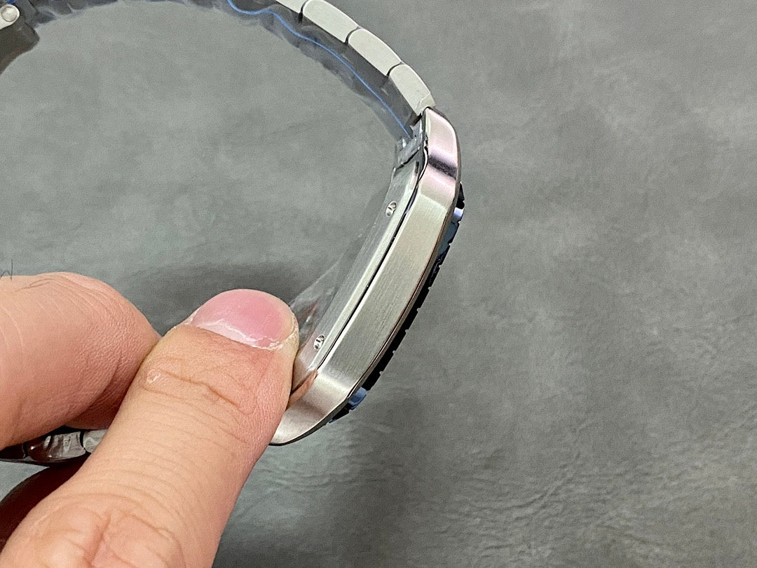 Cartier steel watch case side and bracelet, close-up angle