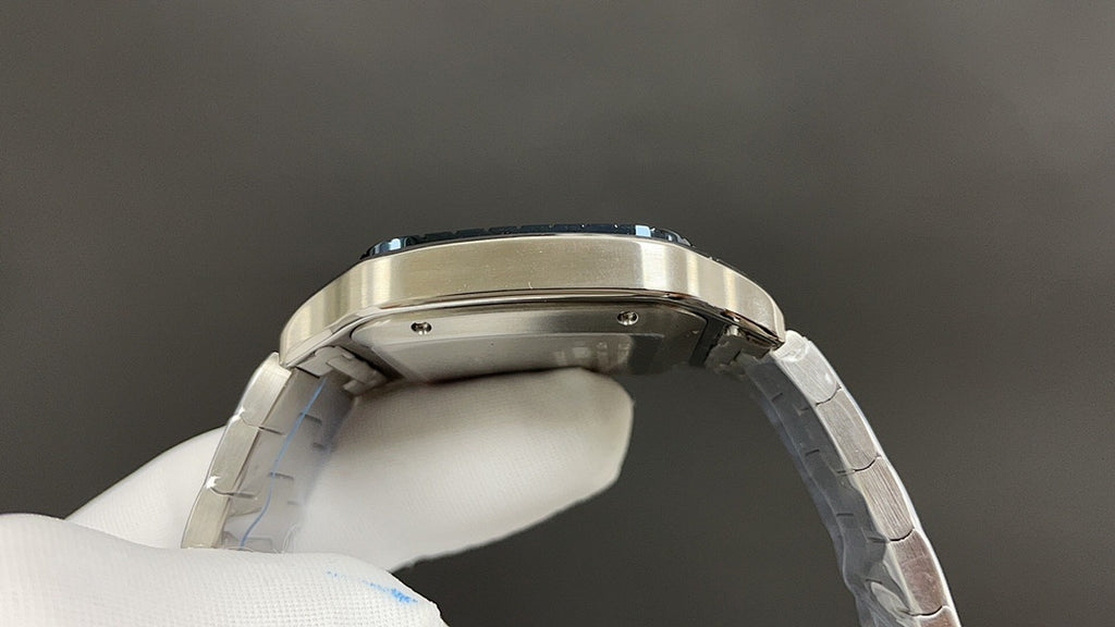 Stainless steel Cartier watch bezel and bracelet links viewed from above