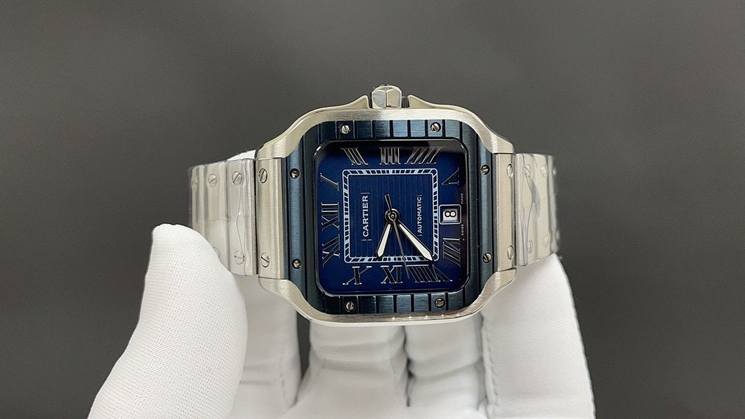 Stainless steel Cartier watch with blue dial and Roman-style markers