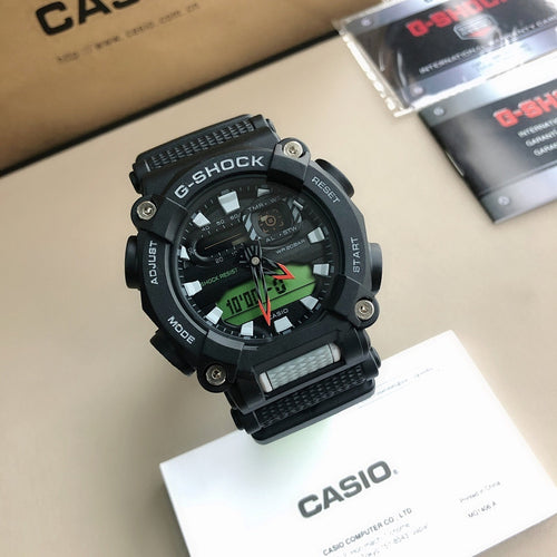 Black digital sports watch with neon green accents, black resin strap
