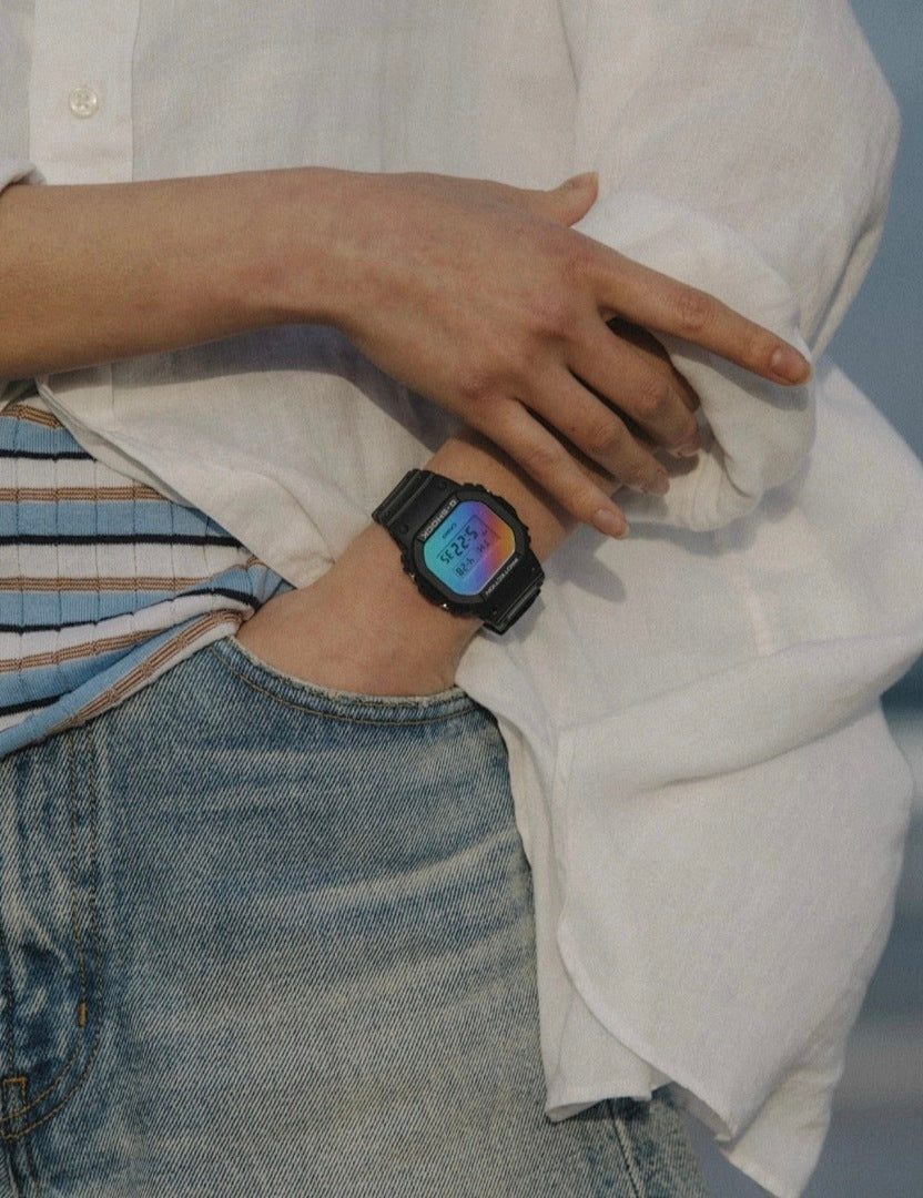 Casio G-Shock watch worn on wrist with colorful digital screen