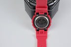 Casio wristwatch with red strap and black backplate detail
