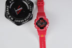 Casio wristwatch with red resin strap and black dial with red accents