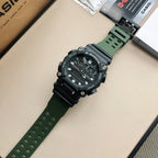 G-Shock digital watch with black face and green resin strap
