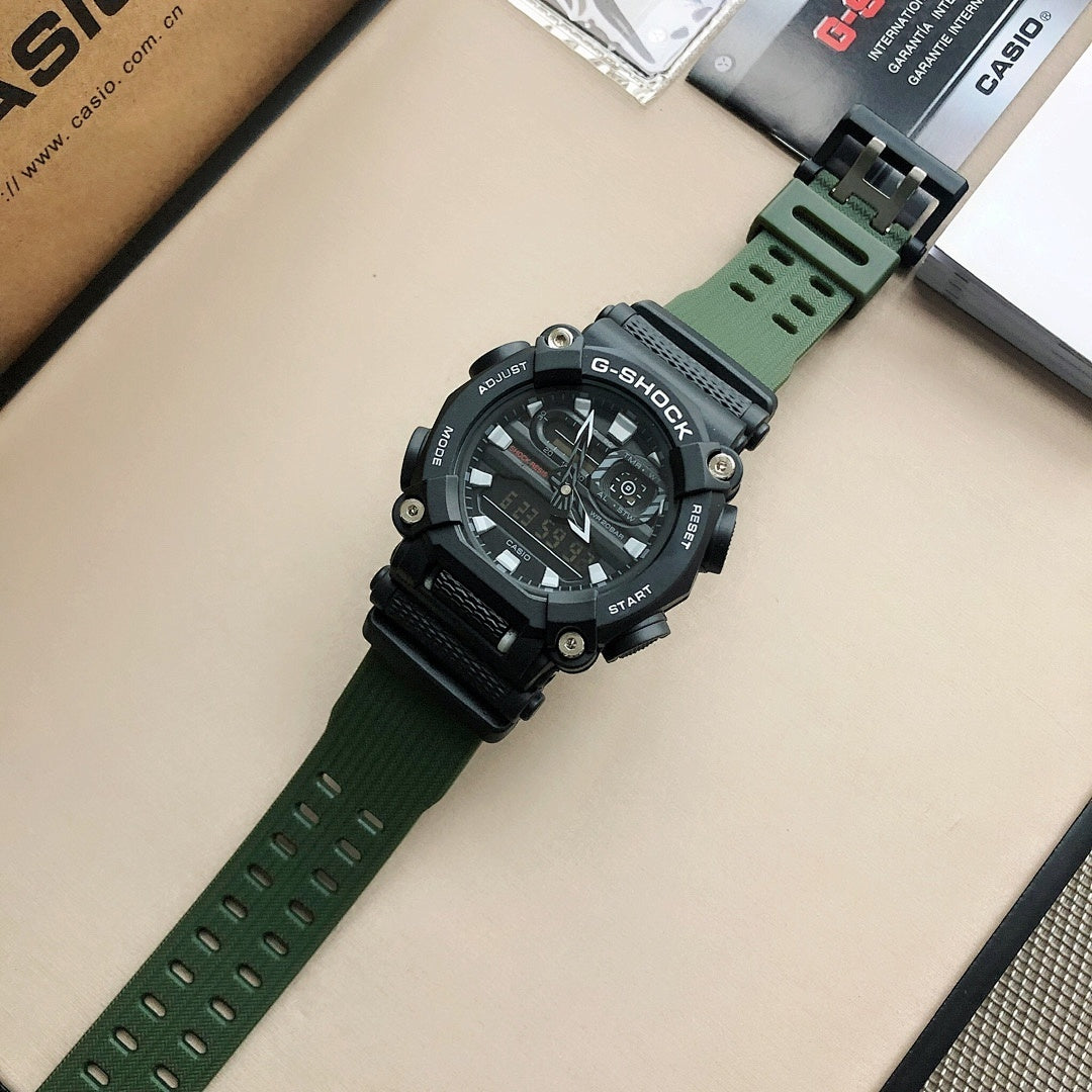 G-Shock digital watch with black face and green resin strap