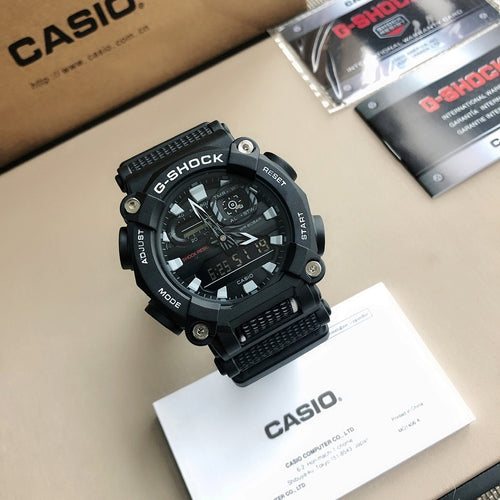 G-Shock digital watch with black resin strap and black round face