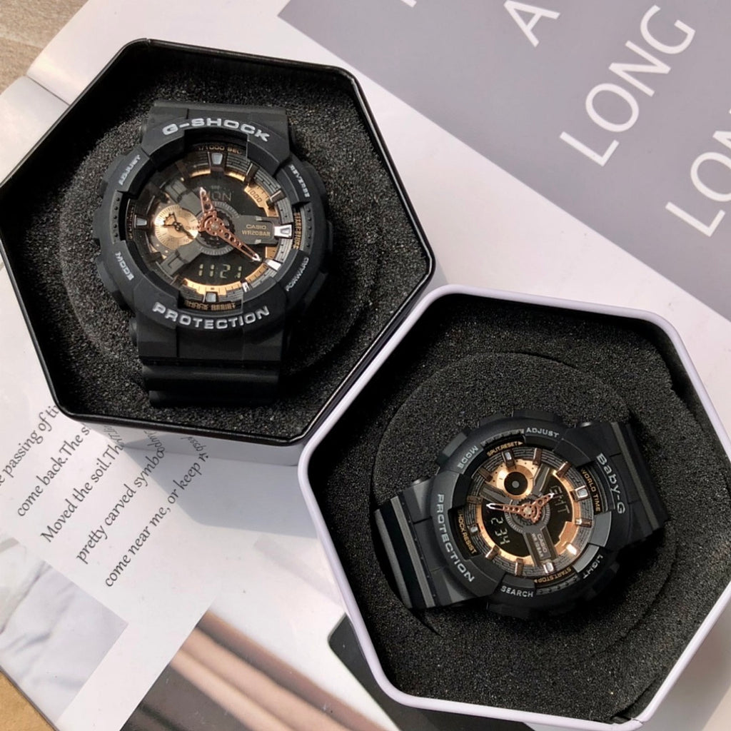 Casio G-Shock watches in hexagonal boxes with black resin straps and gold dials
