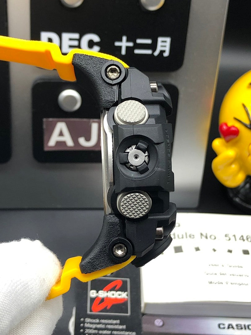 G-Shock Mudmaster wristwatch, side view of case with yellow strap and raised buttons