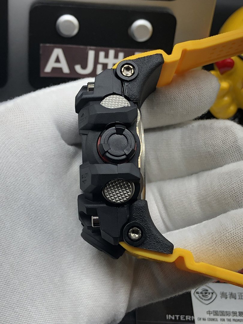 G-Shock Mudmaster wristwatch, side profile with textured buttons and yellow strap