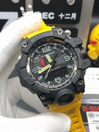 G-Shock Mudmaster wristwatch, angled view, black case with bezel and yellow resin strap