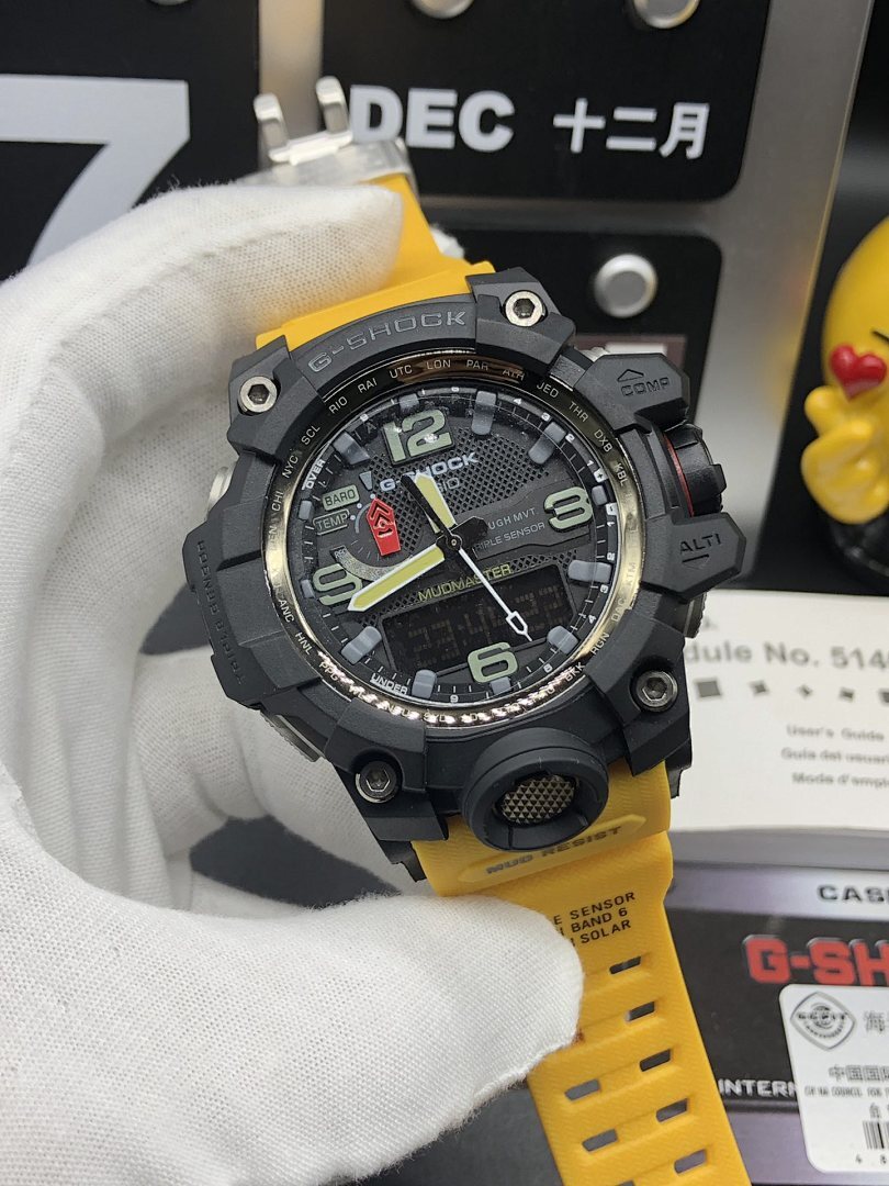 G-Shock Mudmaster wristwatch, front view, black case and yellow resin strap