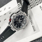Casio G-Shock watch with black bezel and black dial, tilted on product packaging