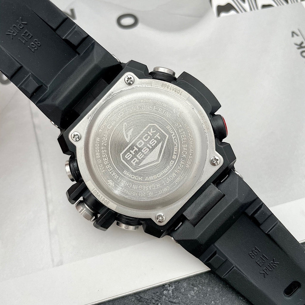 Casio G-Shock watch case back with metal finish and black resin strap