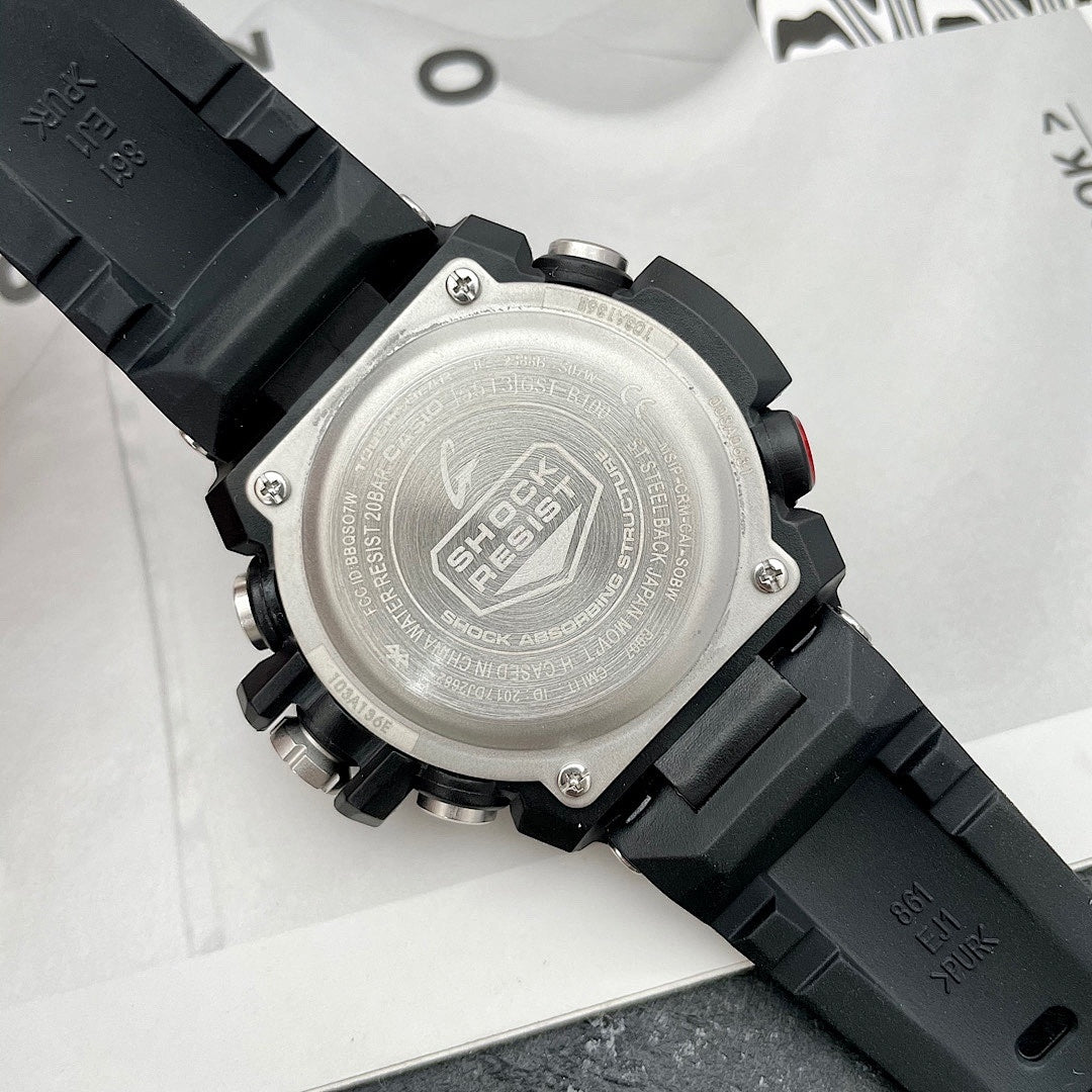Casio G-Shock watch case back with metal finish and black resin strap