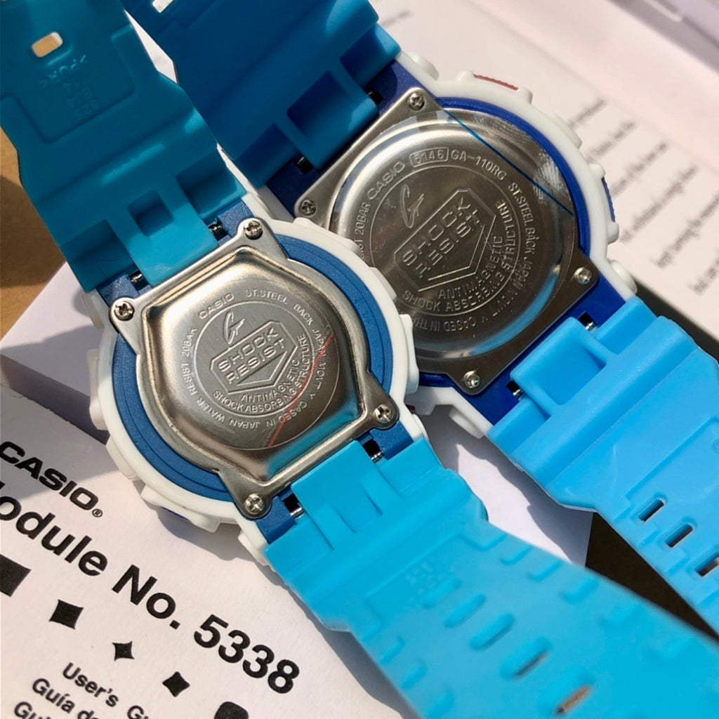Casio watch backs with round metal plates and blue silicone bands