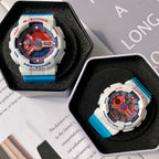 Casio G-Shock and Baby-G watches in open boxes, white cases, blue straps