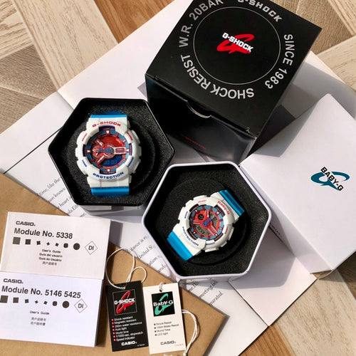 Casio G-Shock and Baby-G watches in black foam trays, white cases, blue straps