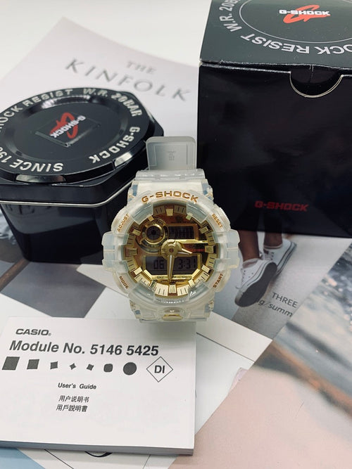 Casio G-Shock watch with light gold dial and clear resin strap