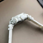 White G-Shock watch side profile with round buttons and textured pushers