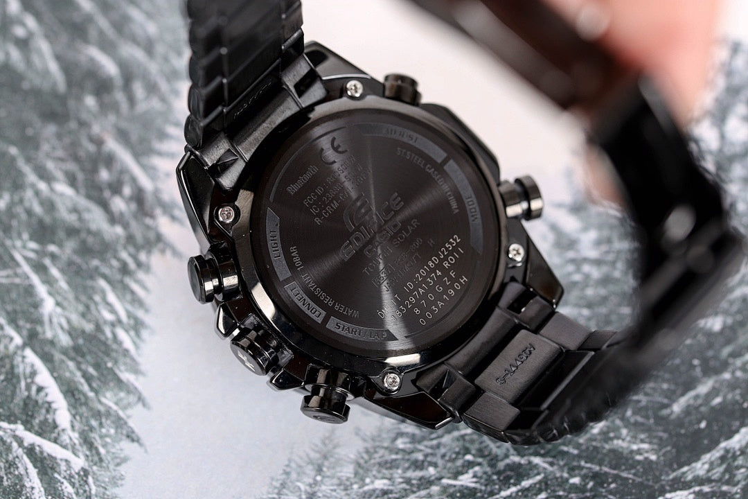 Casio G-Shock watch back with black case and metal bracelet